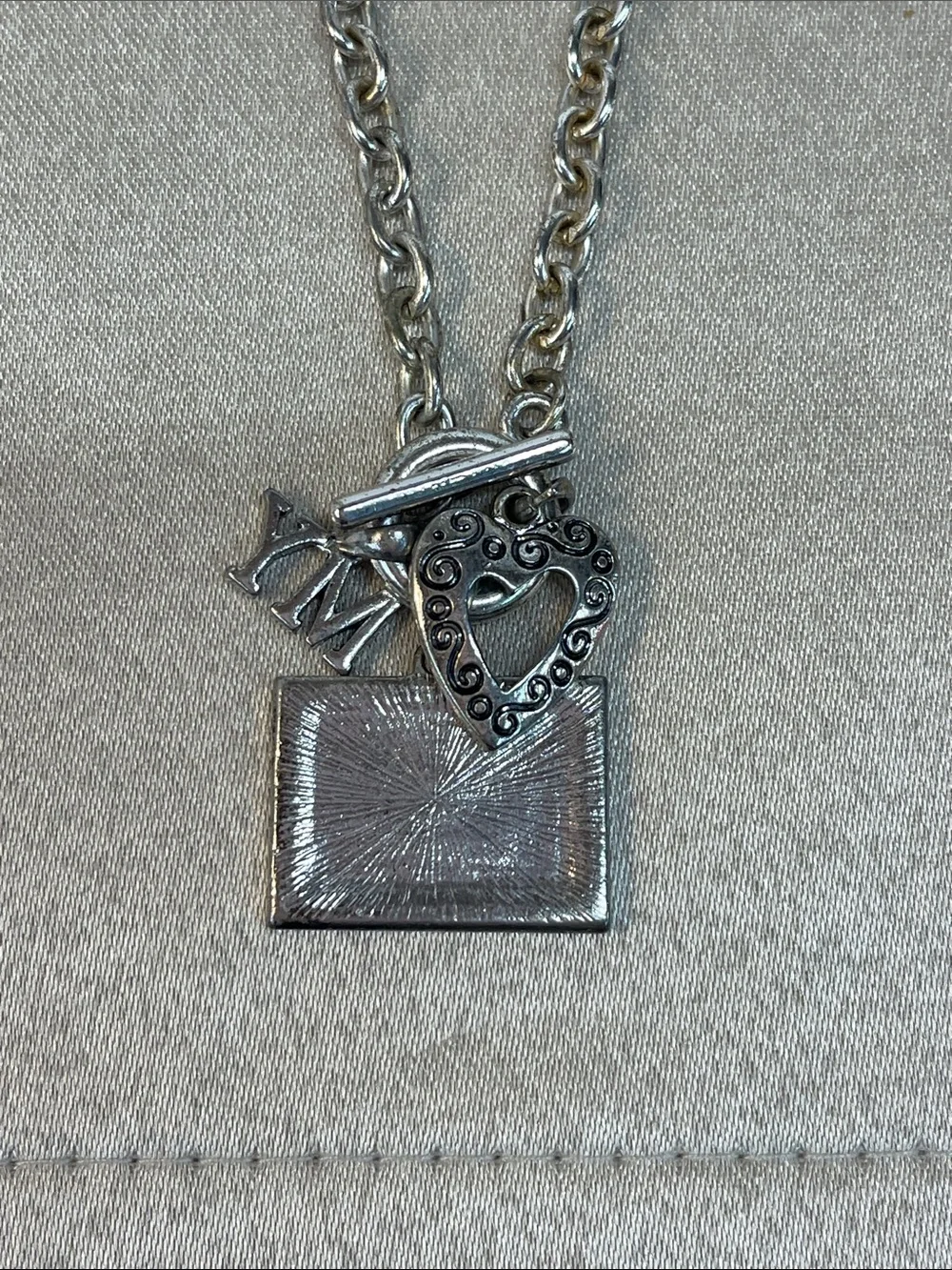 Unknown￼ team pendant